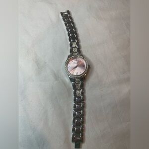 Women’s silver tone watch folio
